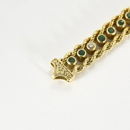 Bracelet Elegant Bracelet en or jaune, diamants et émeraudes 58 Facettes B250662