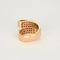 Bague 57 Bague ruban or rose, émeraude et saphirs roses 58 Facettes 240321