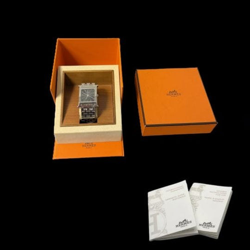Montre Hermès Heure H - Montre en acier, cadran noir quartz 58 Facettes MT42230