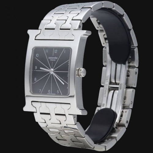 Montre Hermès Heure H - Montre en acier, cadran noir quartz 58 Facettes MT42230