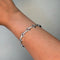 Bracelet Bracelet torsadé en or blanc et diamants 58 Facettes 250473R