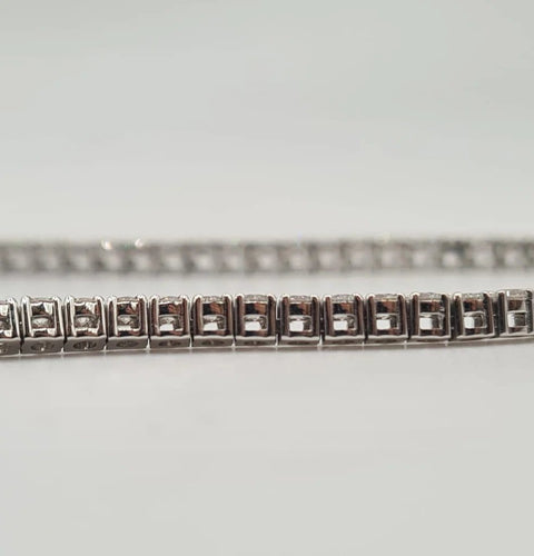 Collier Collier rivière en or blanc et diamants 58 Facettes