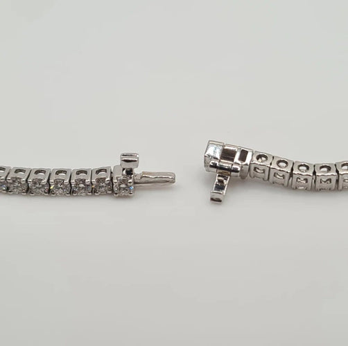 Collier Collier rivière en or blanc et diamants 58 Facettes