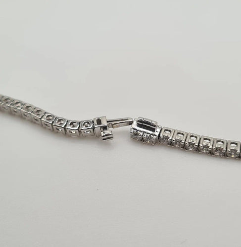Collier Collier rivière en or blanc et diamants 58 Facettes