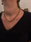 Collier Collier à maillons entrelacés en or rose 18 carats 58 Facettes