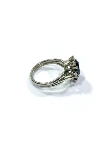 Bague 52 Bague en or blanc 18 carats avec diamants et pierre verte synthétique 58 Facettes