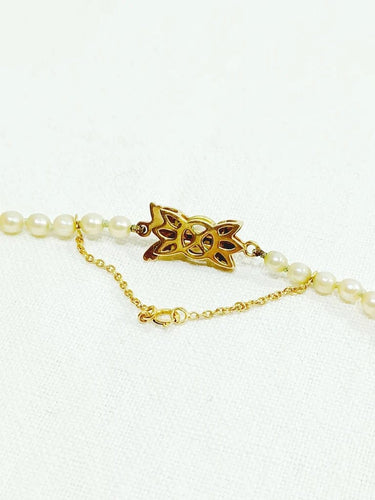 Collier Collier de perles de culture en or 18 carats 58 Facettes 3117