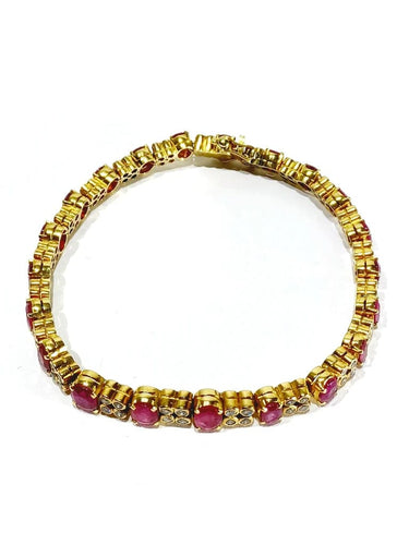 Bracelet Bracelet en or jaune, diamants et rubis 58 Facettes