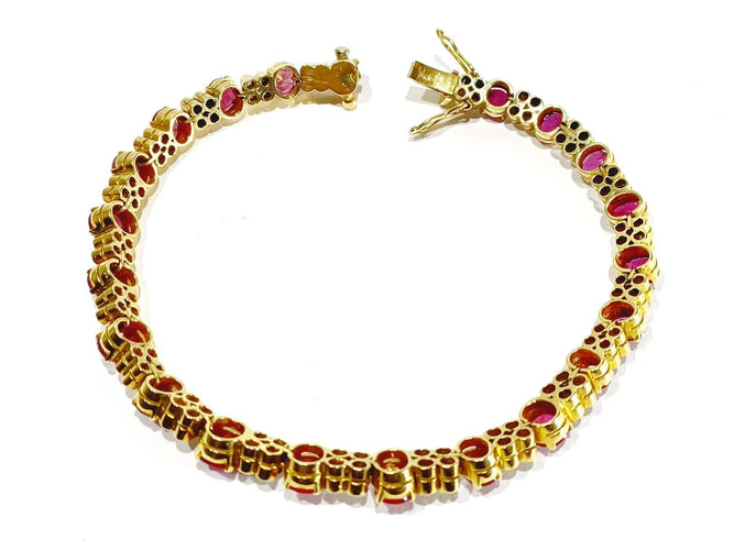 Bracelet Bracelet en or jaune, diamants et rubis 58 Facettes
