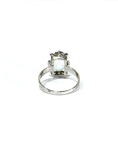 Bague 55 Bague en or blanc 18 carats sertie d’une aigue-marine 58 Facettes