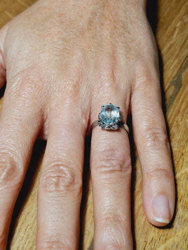 Bague 55 Bague en or blanc 18 carats sertie d’une aigue-marine 58 Facettes