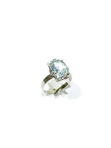 Bague 55 Bague en or blanc 18 carats sertie d’une aigue-marine 58 Facettes
