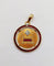 Pendentif Augis - Pendentif médaille d’amour 23 mm en or jaune 18k, diamants et rubis 58 Facettes A03182