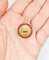 Pendentif Augis - Pendentif médaille d’amour 23 mm en or jaune 18k, diamants et rubis 58 Facettes A03182