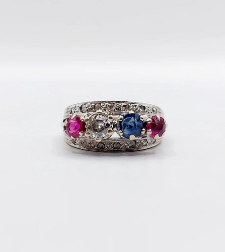 Bague 51 Bague jarretière Art déco en or blanc 18k, diamants, saphir et rubis 58 Facettes A03240