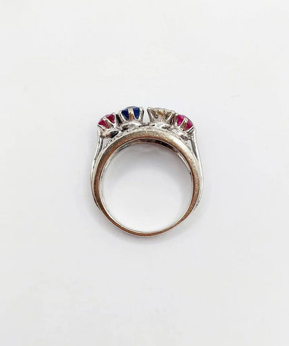 Bague 51 Bague jarretière Art déco en or blanc 18k, diamants, saphir et rubis 58 Facettes A03240