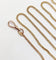 Collier Chaîne sautoir antique en or jaune 14K à mailles gourmette 58 Facettes A05536