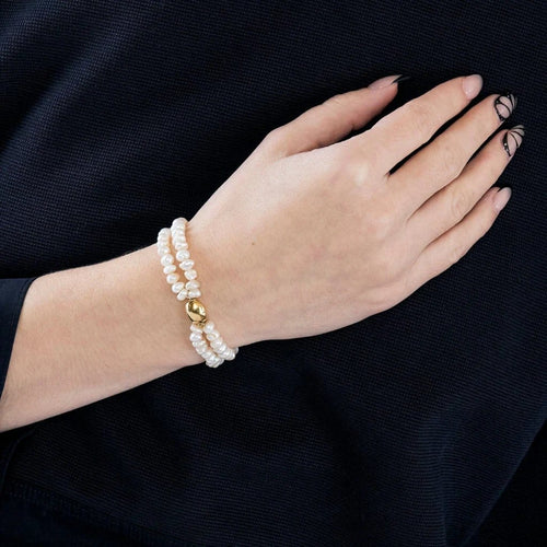 Bracelet Bracelet en or jaune 750 avec perles baroques 58 Facettes LP935/BET
