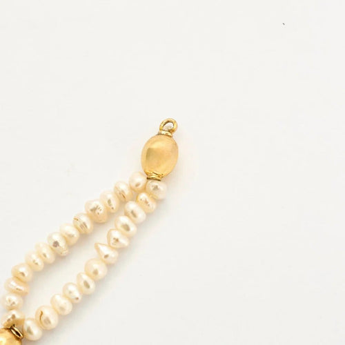Bracelet Bracelet en or jaune 750 avec perles baroques 58 Facettes LP935/BET