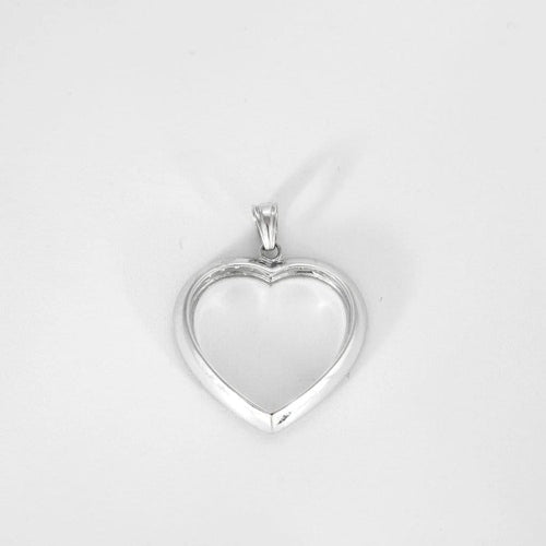 Pendentif Pendentif cœur en or blanc 18 carats et diamants 58 Facettes LP1115/16