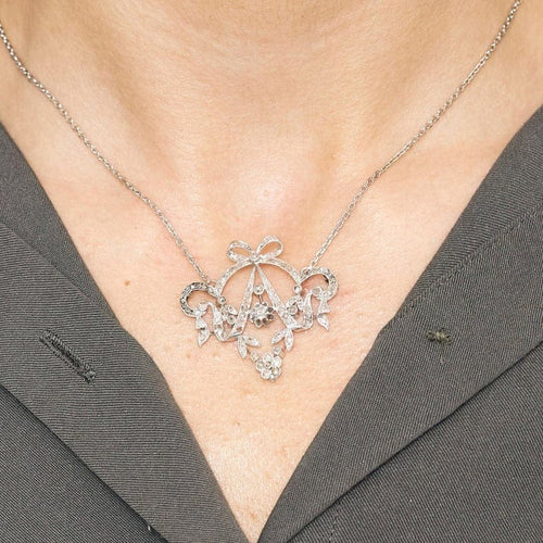Collier Collier guirlande - Collier en or blanc et diamants 58 Facettes LP1188