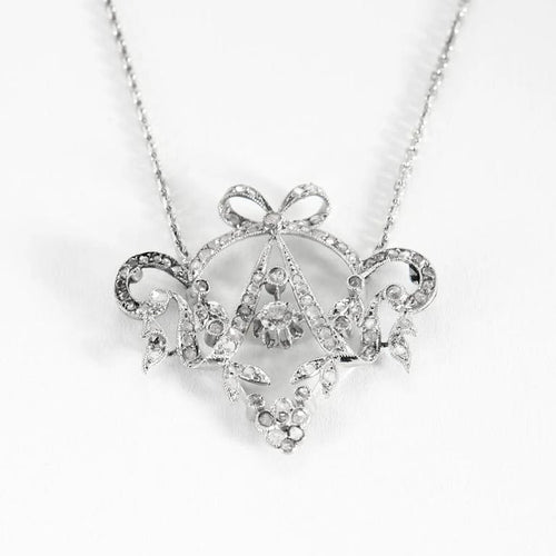 Collier Collier guirlande - Collier en or blanc et diamants 58 Facettes LP1188
