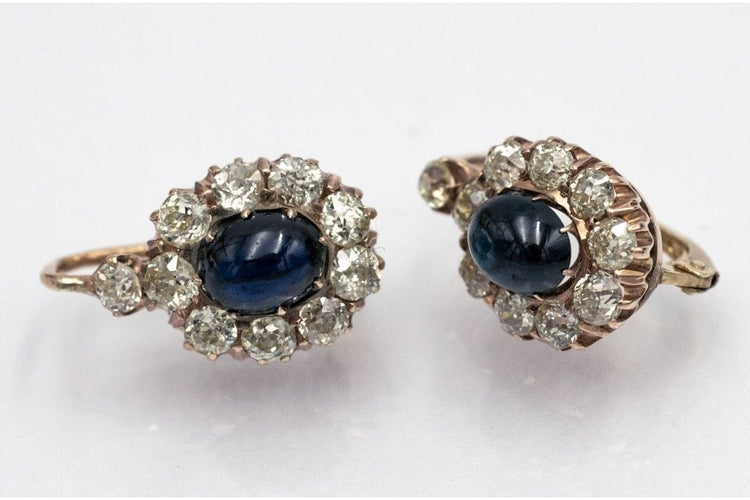 Boucles d'oreilles Boucles d’oreilles en or 14 carats avec diamants et saphirs cabochon 58 Facettes 10551