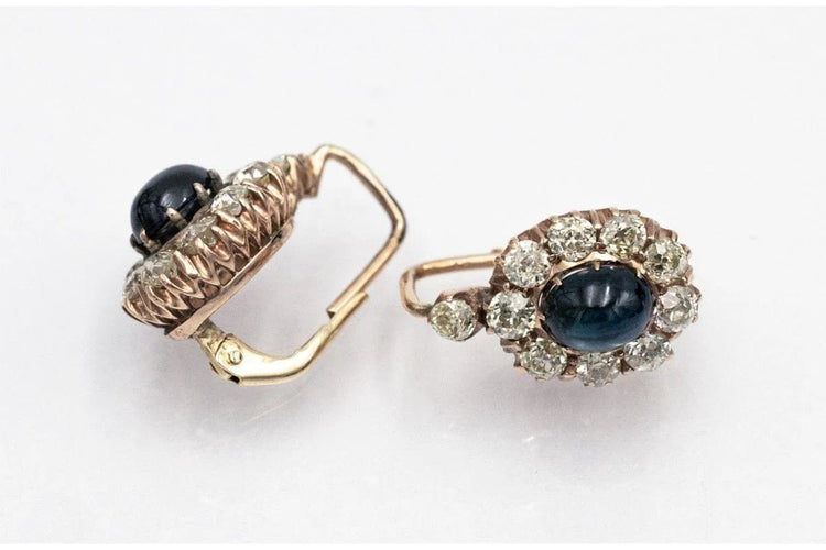 Boucles d'oreilles Boucles d’oreilles en or 14 carats avec diamants et saphirs cabochon 58 Facettes 10551