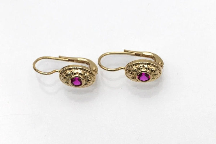Boucles d'oreilles Boucles d'oreilles vintage en or jaune et rubis synthétiques 58 Facettes 10738