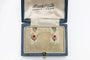 Boucles d'oreilles Boucles d'oreilles vintage en or jaune et rubis synthétiques 58 Facettes 10738