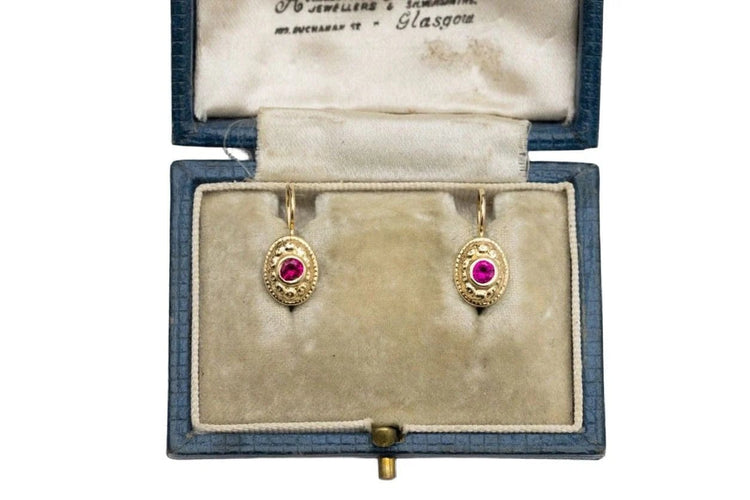 Boucles d'oreilles Boucles d'oreilles vintage en or jaune et rubis synthétiques 58 Facettes 10738