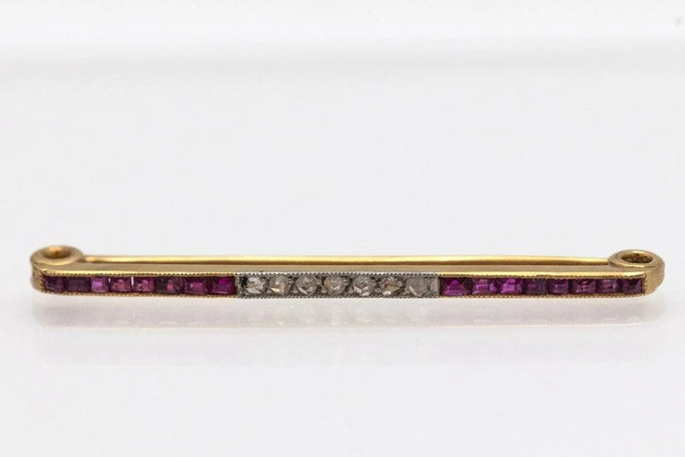 Broche Broche ancienne en or jaune, platine, rubis et diamants 58 Facettes 9209