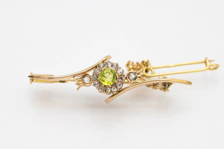 Broche Broche ancienne en or jaune avec olivine et diamants 58 Facettes 10280