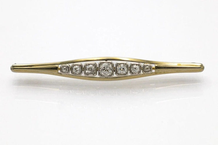 Broche Broche allongée en or jaune, platine et diamants 58 Facettes 10964