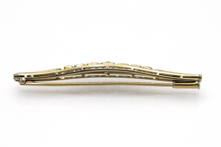Broche Broche allongée en or jaune, platine et diamants 58 Facettes 10964