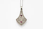 Pendentif Pendentif ancien en or 18 carats, platine, diamants et tourmalines 58 Facettes 9962