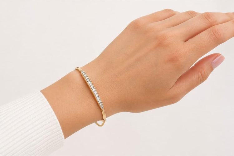 Bracelet Bracelet rigide ouvrant en or bicolore 14 carats et diamants 58 Facettes 10080