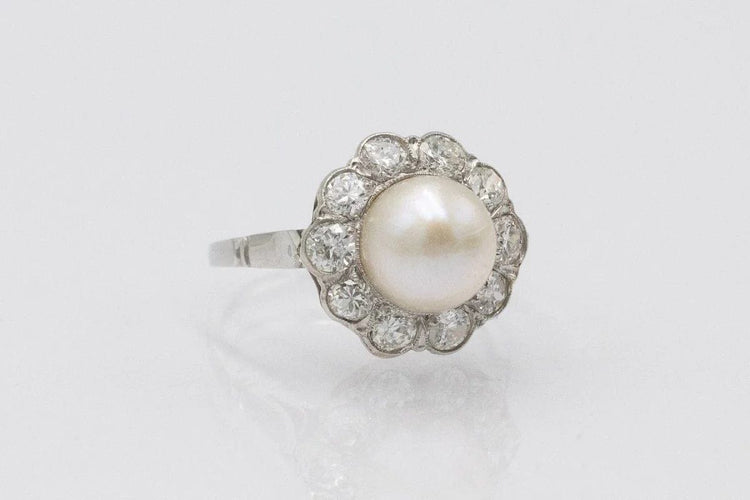 Bague 54 Bague en platine 950 ornée d’une perle et de diamants (1,00 ct) 58 Facettes 11328
