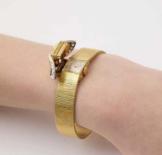 Montre Movado - Montre bracelet en or jaune 750/1000 avec diamants 58 Facettes