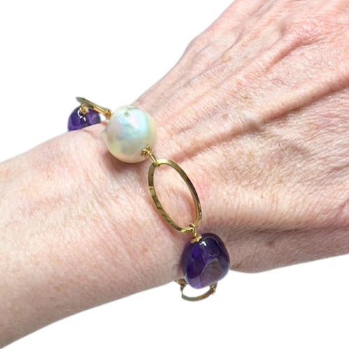 Bracelet Bracelet contemporain en or jaune 18 carats avec améthyste et perle 58 Facettes Q1000A