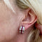 Boucles d'oreilles Boucles d’oreilles - Design contemporain en or 18 carats avec diamants et rubis 58 Facettes Q250B