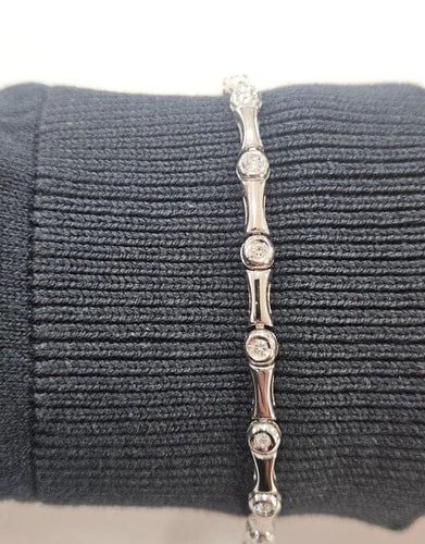 Bracelet Bracelet design contemporain en or 18 carats avec diamants 58 Facettes Q263B(99)