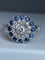 Bague 57 Bague fleur Art déco en or 18 ct, diamants et saphirs 58 Facettes AB45