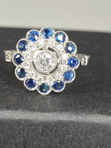 Bague 57 Bague fleur Art déco en or 18 ct, diamants et saphirs 58 Facettes AB45