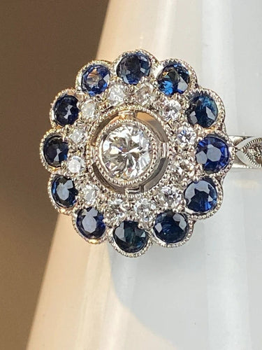 Bague 57 Bague fleur Art déco en or 18 ct, diamants et saphirs 58 Facettes AB45