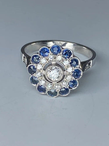 Bague 57 Bague fleur Art déco en or 18 ct, diamants et saphirs 58 Facettes AB45