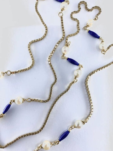 Collier Collier chaîne en or jaune 18 carats, perles et émail bleu 58 Facettes AB377