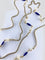 Collier Collier chaîne en or jaune 18 carats, perles et émail bleu 58 Facettes AB377
