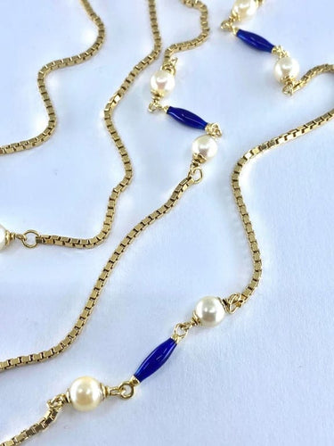 Collier Collier chaîne en or jaune 18 carats, perles et émail bleu 58 Facettes AB377