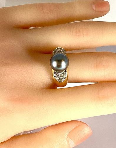 Bague 52 Bague en or jaune 18 carats avec perle de Tahiti et diamants 58 Facettes AB444